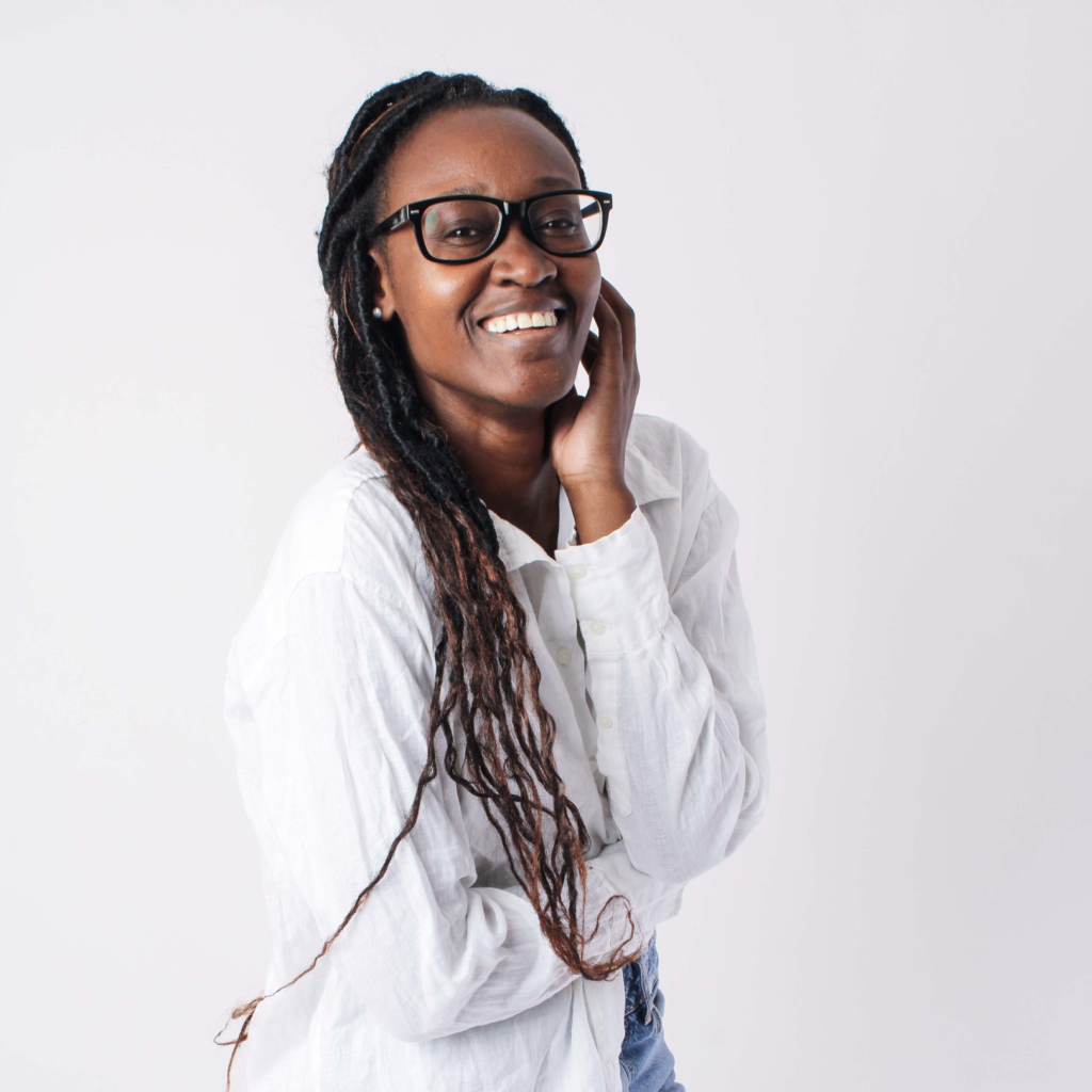 sam-smiling-left-hand-on-face